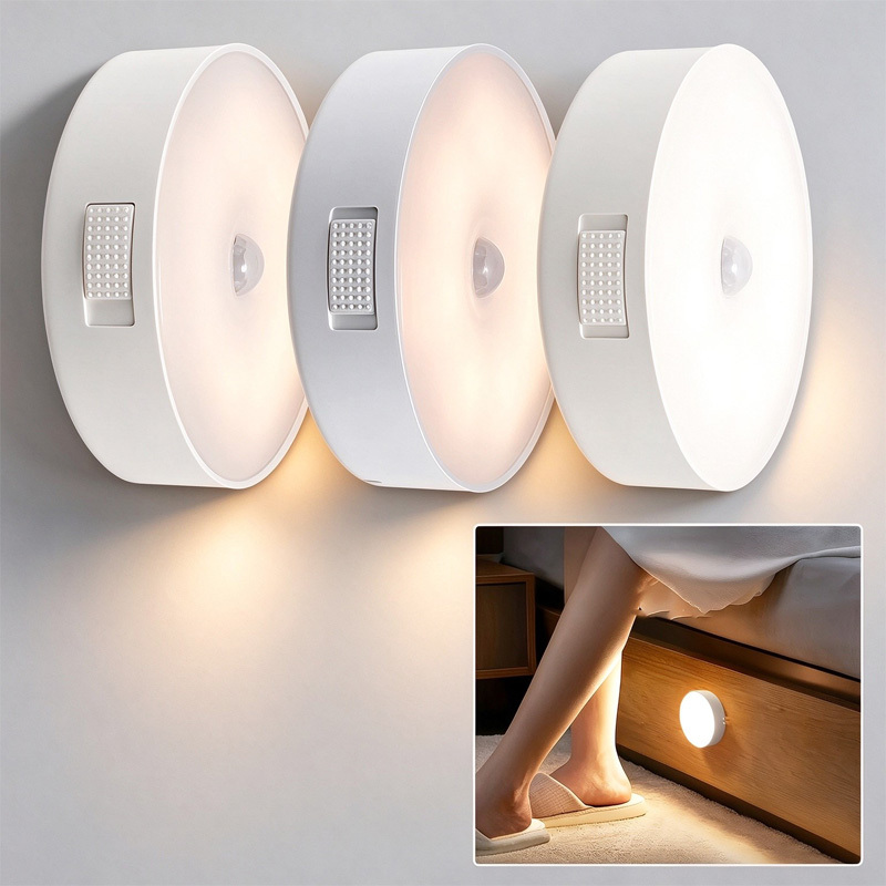 Three round LED lights glowing in a row on a wall